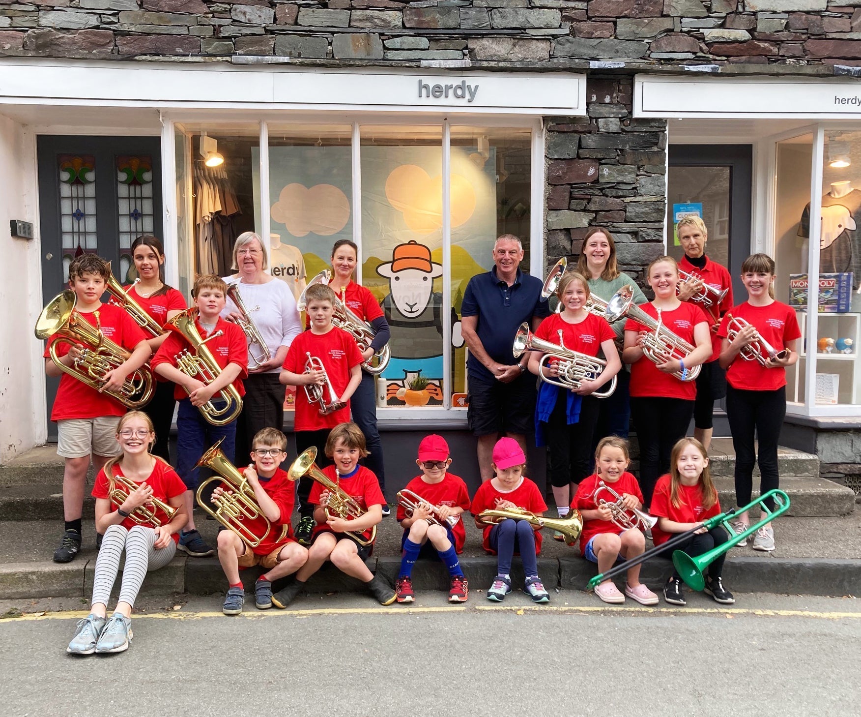 Grasmere Brass Band outside Herdy store Grasmere Lake District