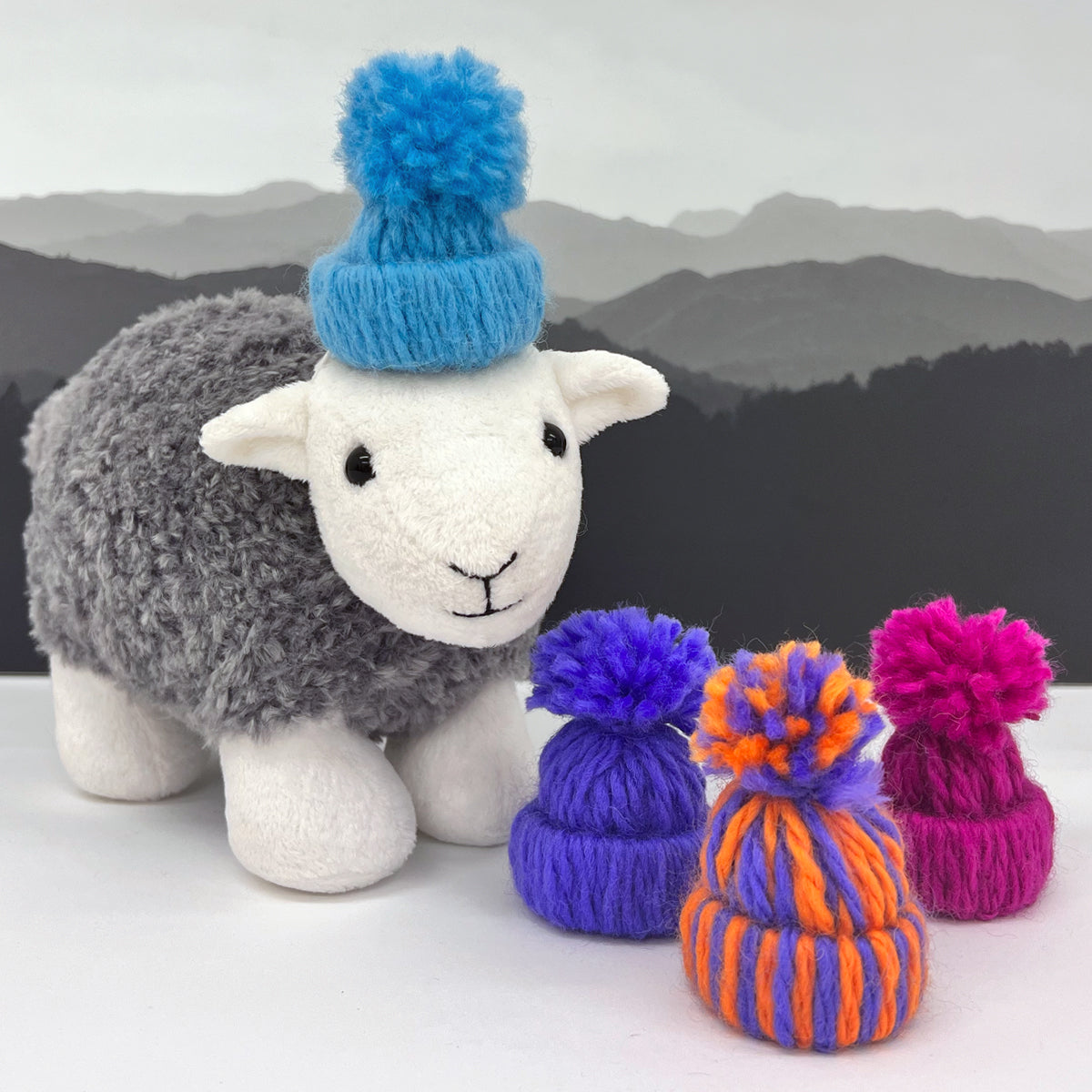 Little Herdy soft toy in a wool hat