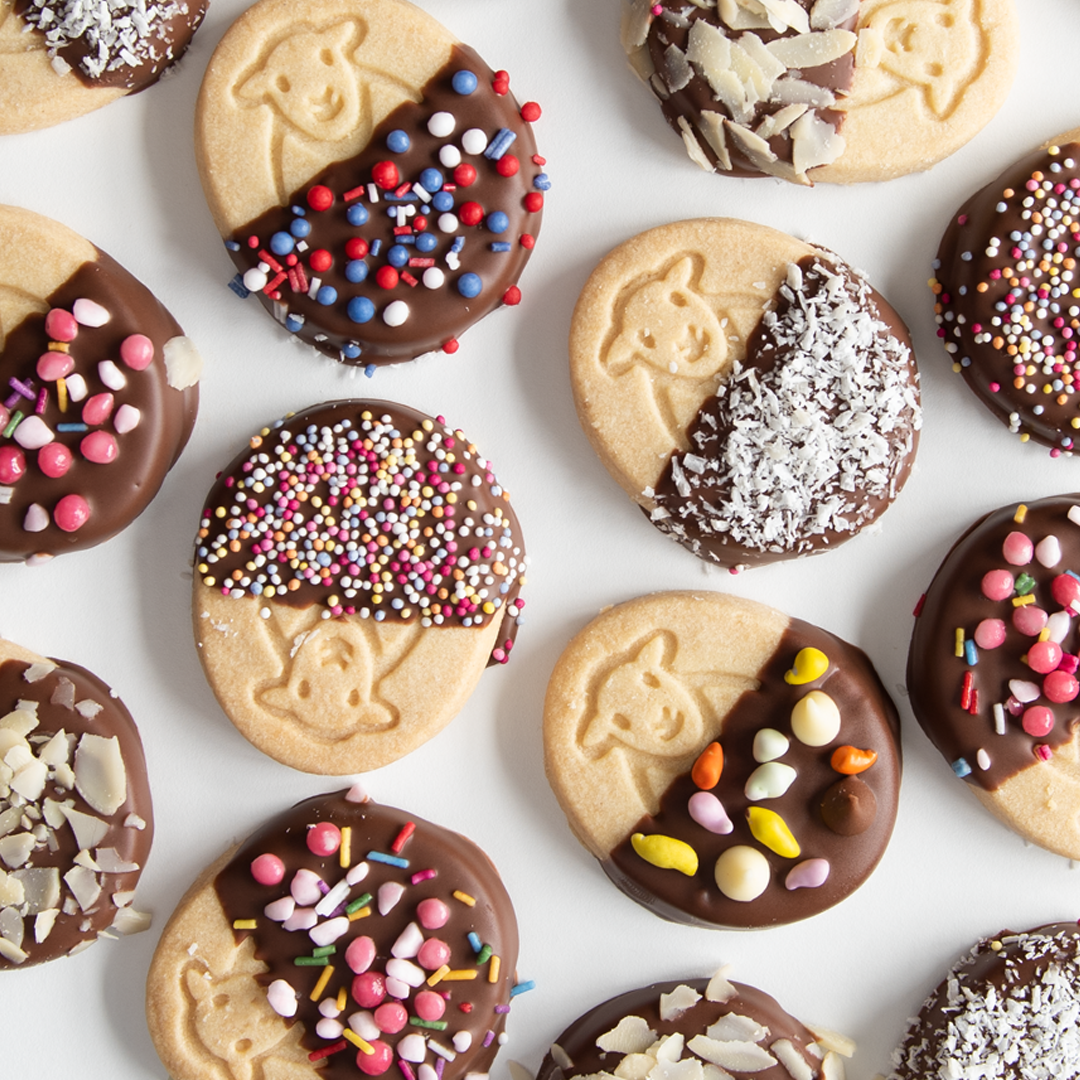 Herdy Sheep Dip Dunkers: Herdy Shortbread dipped in melted chocolate, decorated with sprinkles